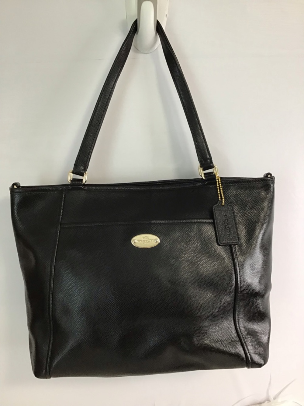 Coach Black Leather Tote with Gold Accent Plaque